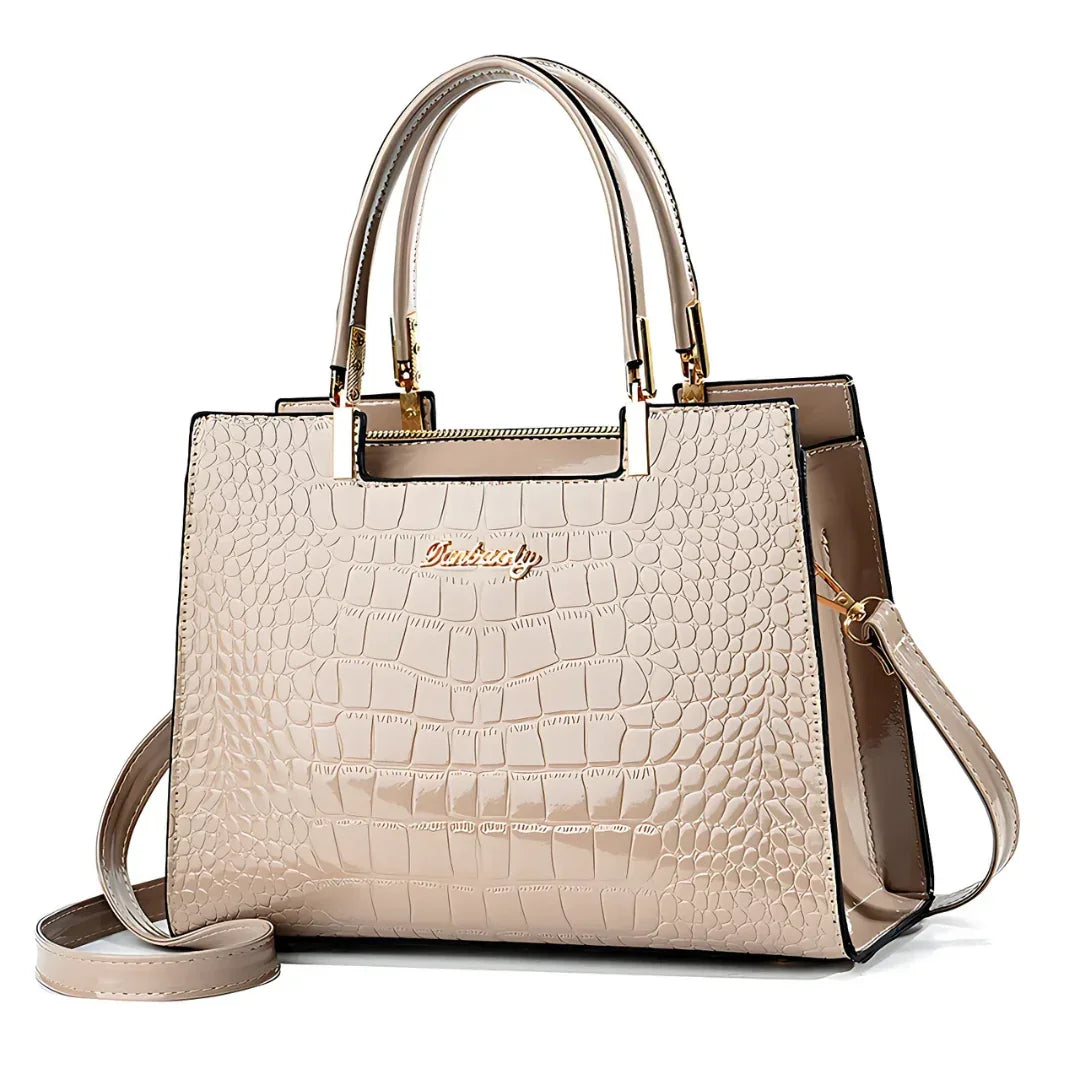 Beige crocodile pattern leather handbag with gold hardware and detachable strap
