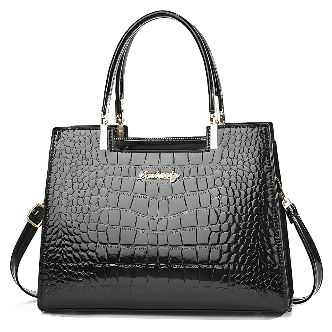 Black crocodile pattern leather handbag with gold hardware and dual handles