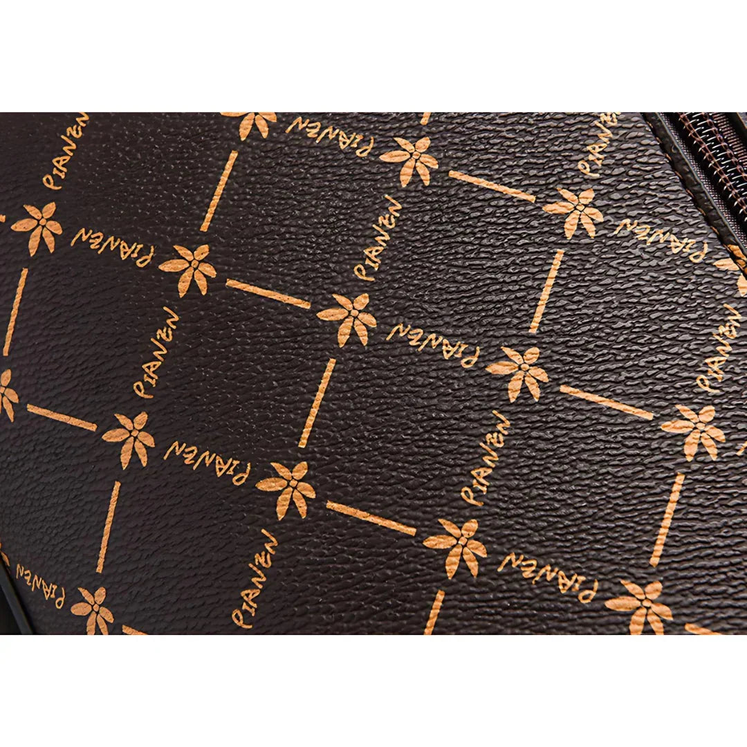 Brown leather bag with PIANZI logo and gold floral geometric pattern