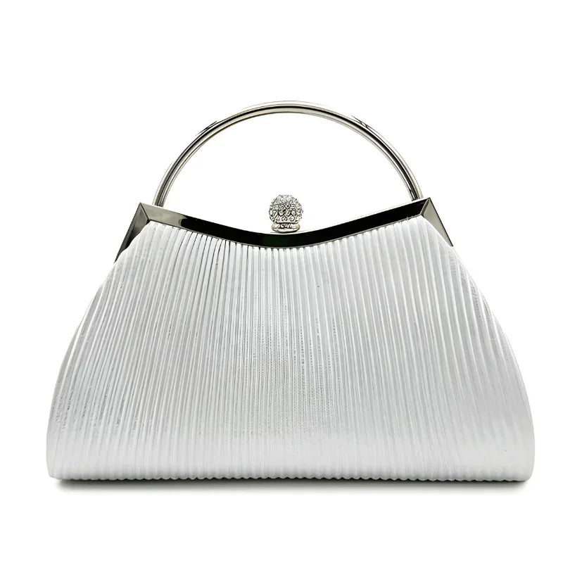 White pleated evening handbag with silver handle and crystal clasp, elegant purse