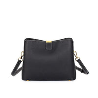 Black leather crossbody bag with gold hardware and white stitching on a white background