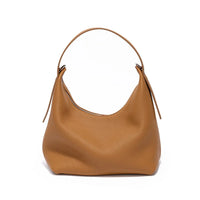 Brown leather hobo shoulder bag with textured finish on white background