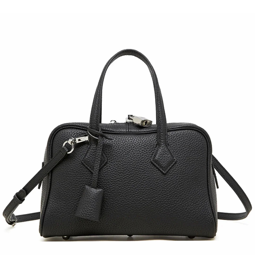 Black textured leather handbag with top handles and detachable shoulder strap