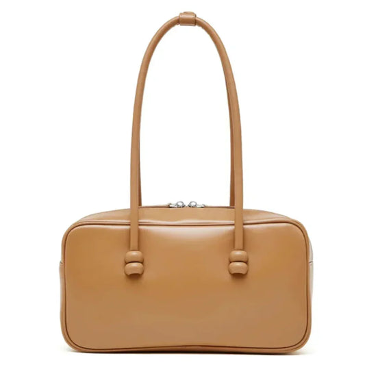 Tan rectangular leather handbag with double top handles on a white background