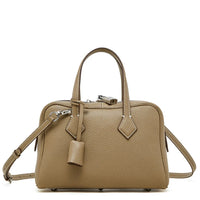 Taupe leather satchel handbag with top handles, detachable strap, and silver hardware