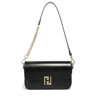 Black leather shoulder bag with gold chain strap and geometric metal clasp on white background