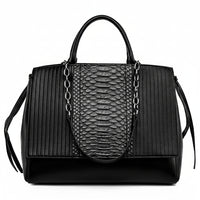Black leather handbag with snakeskin texture, metal chain strap, and structured design