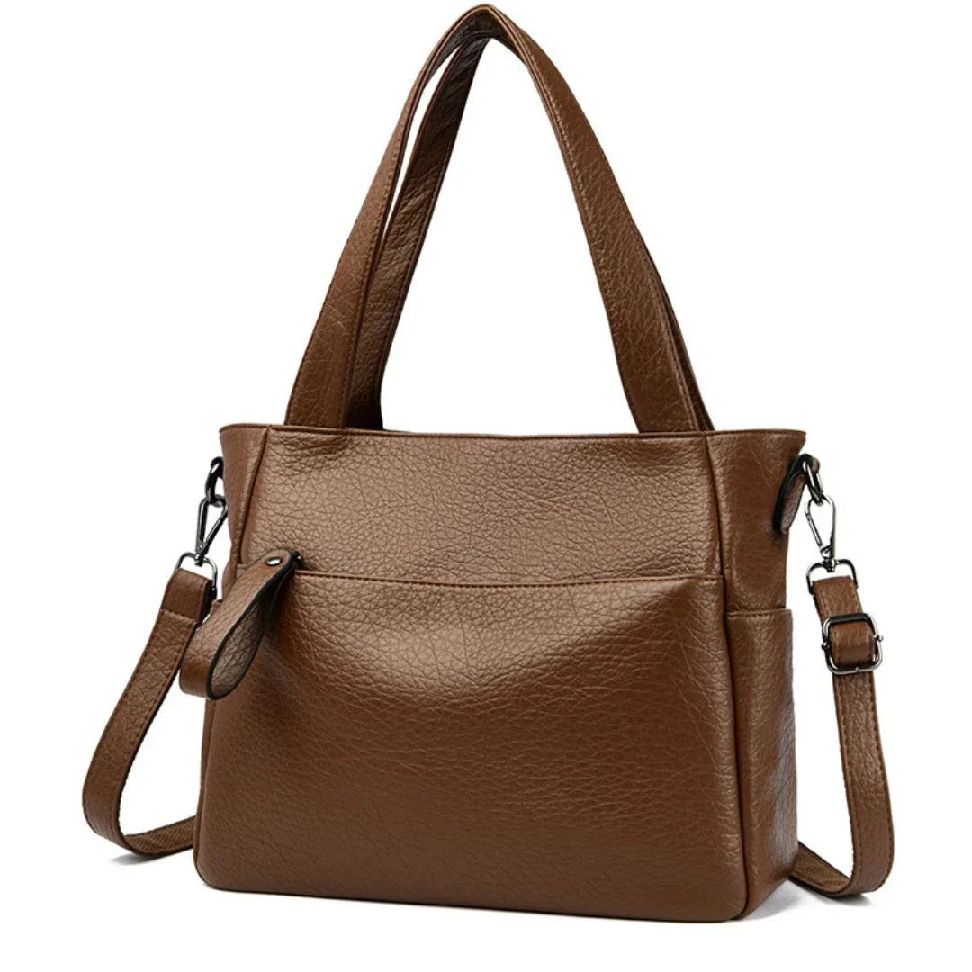 Brown leather tote handbag with double handles and detachable shoulder strap