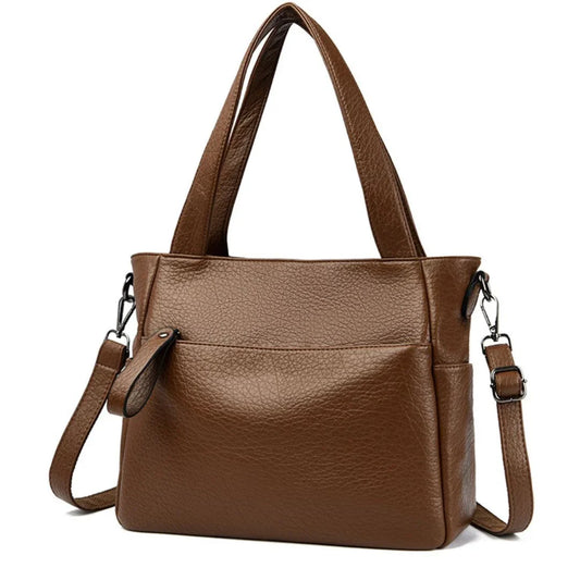 Brown leather tote handbag with double handles and detachable shoulder strap