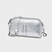 Metallic silver crossbody bag with chain strap and zipper on a plain light background