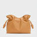 Tan leather clutch bag with ruffled top and knotted side drawstrings on white background