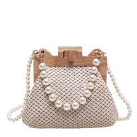 Woven straw handbag with wooden frame and pearl beaded handle, elegant summer purse