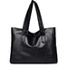 Black leather tote bag with dual handles on white background