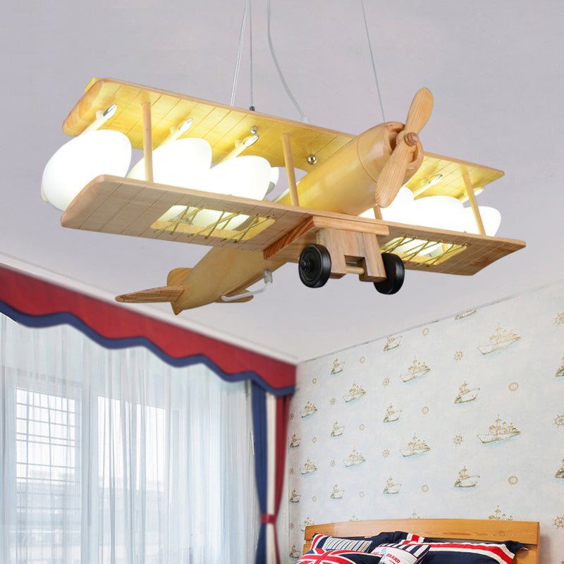 Nordic Style Beige Pendant Light Glider Shaped Wood Hanging Light for Kindergarten - Rebooters