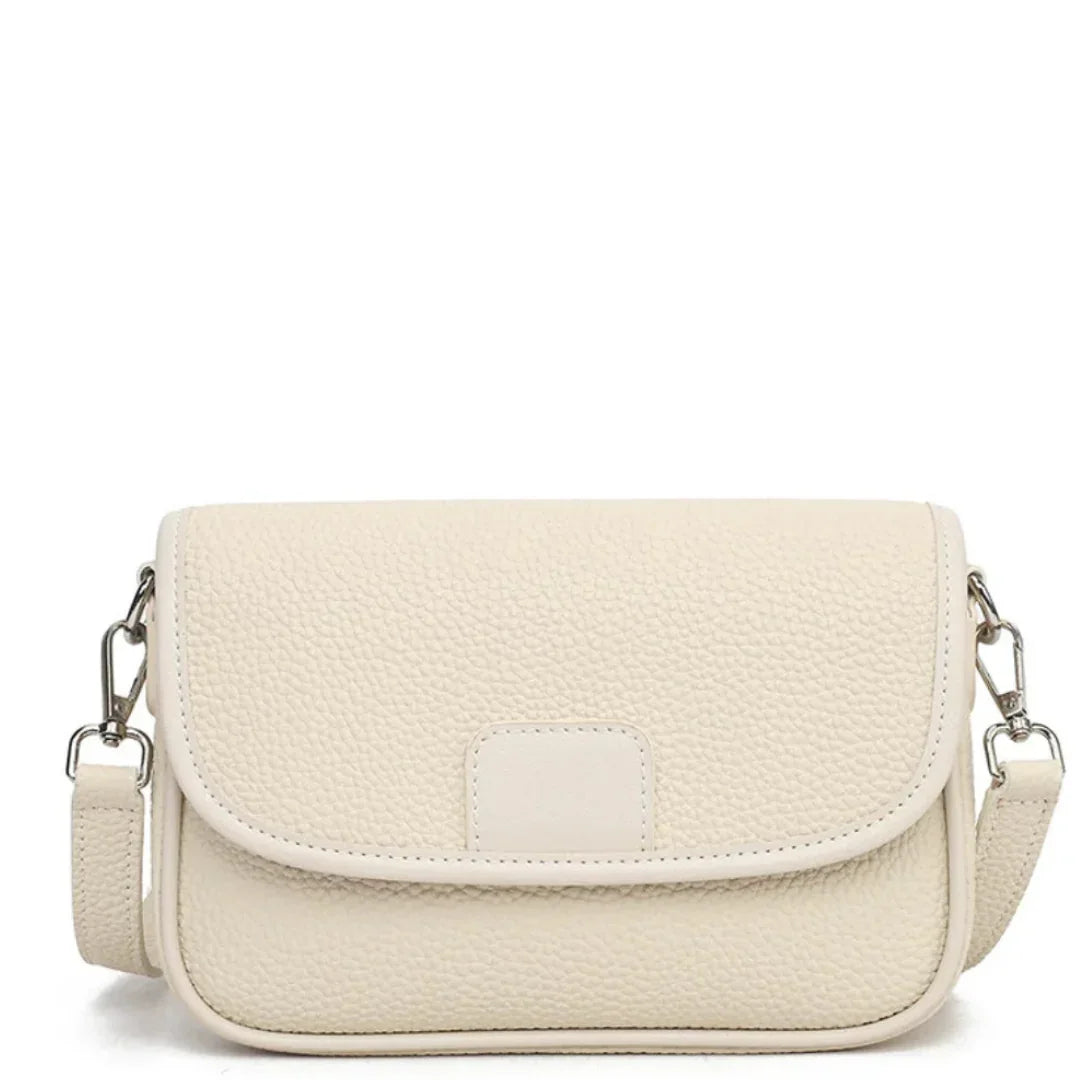 Cream textured leather crossbody bag with flap and detachable shoulder strap