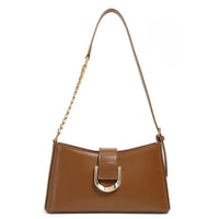 Brown leather shoulder bag with gold chain strap and metallic buckle on white background