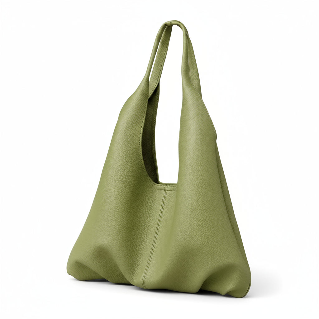 Sage green leather tote bag with modern minimalist design on white background