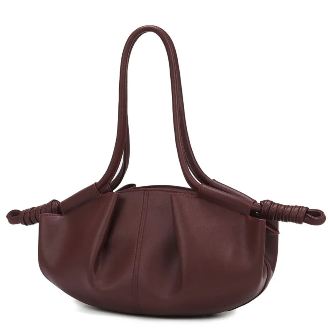 Maroon leather shoulder bag with double handles and knotted side details