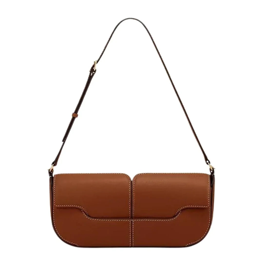 Brown leather shoulder bag with white stitching and adjustable strap on white background
