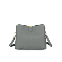 Gray leather crossbody bag with gold hardware on white background