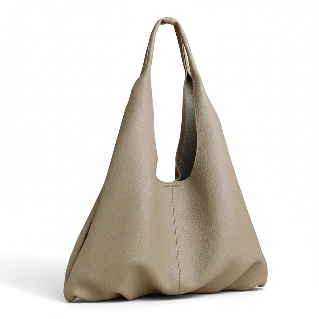 Taupe leather slouchy hobo bag with minimalist design on white background