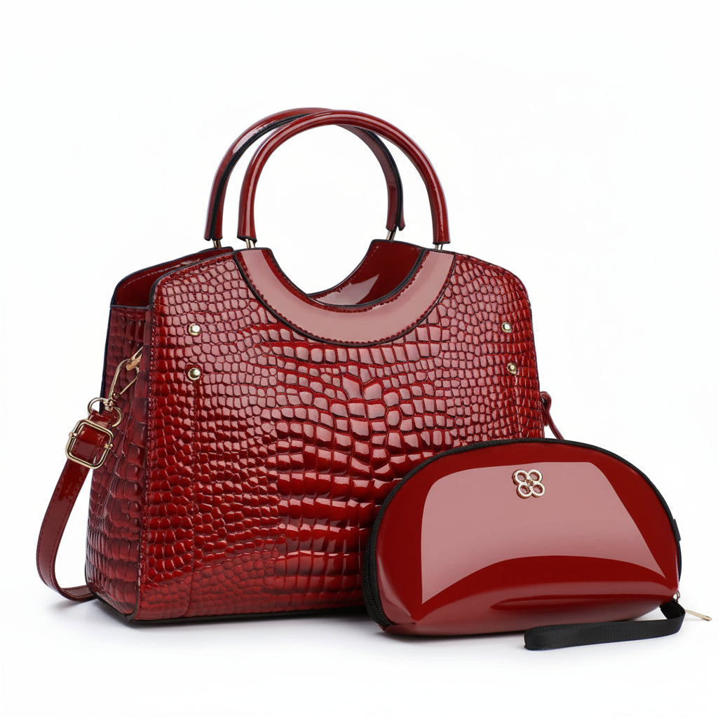 Glossy red crocodile pattern handbag with matching red cosmetic pouch
