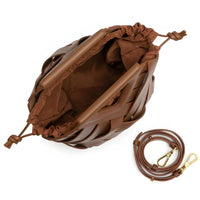 Brown woven leather bucket bag with drawstring closure and detachable strap on white background