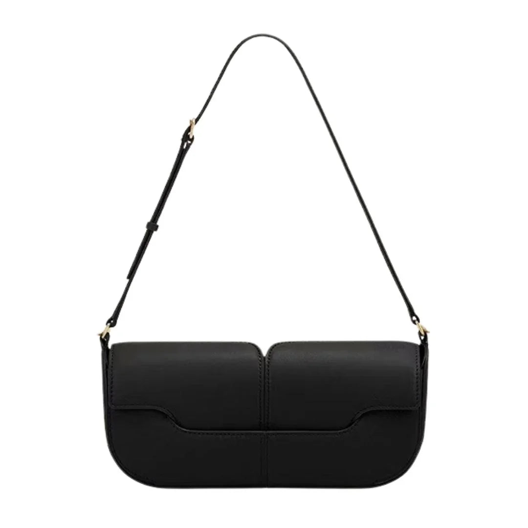 Black leather shoulder bag with adjustable strap and minimalistic design on white background