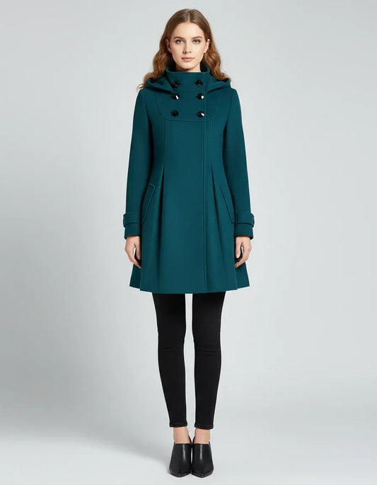Teal coat worn by a model on a light gray background