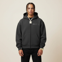 Black hoodie with 'BELIEVE' text on a dark gray background