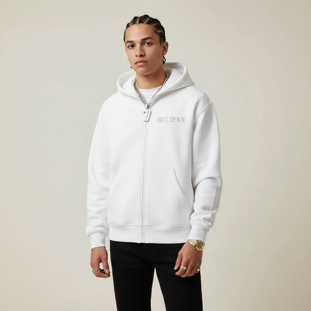 White hoodie with 'BELIEVE' text on a white background