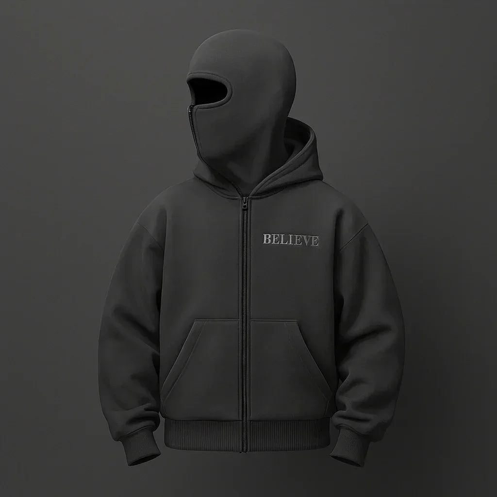 Black hoodie with 'BELIEVE' text on a dark gray background