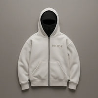 White hoodie with 'BELIEVE' text on a gray background