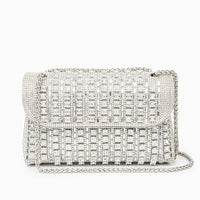Silver rhinestone evening bag with chain strap and geometric crystal design on white background