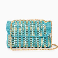 Turquoise rhinestone clutch bag with gold chain strap and geometric crystal design