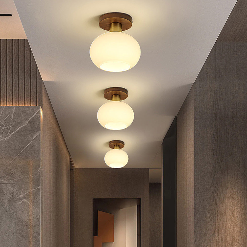 White Spherical Corridor Ceiling Light for Modern Spaces - Rebooters