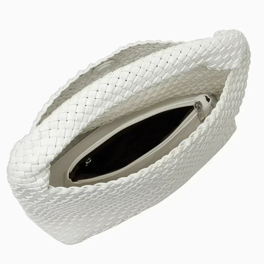 White woven leather hobo bag with zipper pocket, open top view against white background