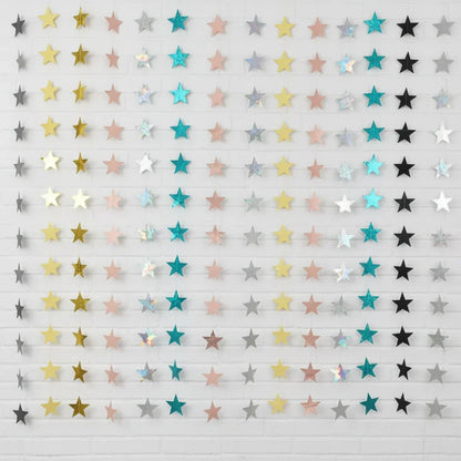 Star-shaped confetti in gold, pink, and silver on a white background