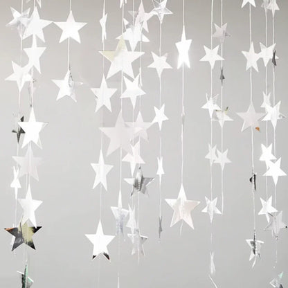 Star-shaped decorations hanging against a gray background