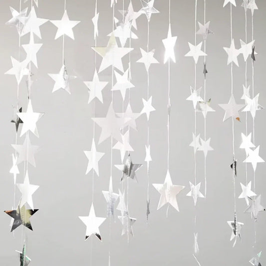 Star-shaped decorations hanging against a gray background