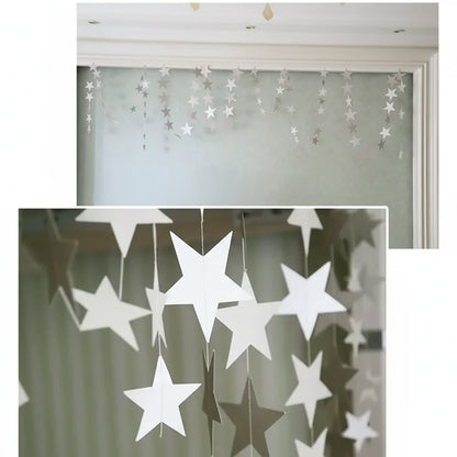 Star-shaped window decorations on a curtain with close-up inset