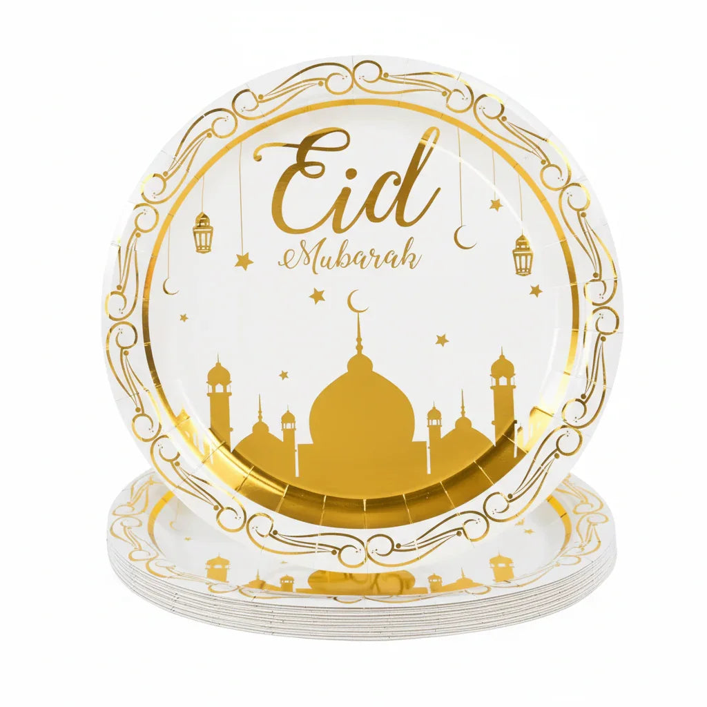 Decorative plate with 'Eid Mubarak' text and gold designs on a white background