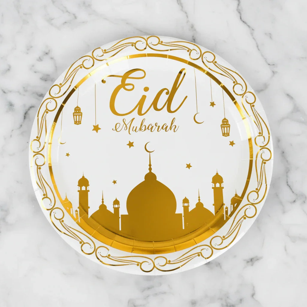 Round paper plate with 'Eid Mubarak' text on a Marble surface