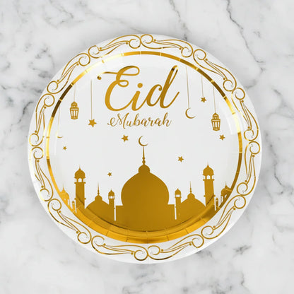 Round paper plate with 'Eid Mubarak' text on a Marble surface