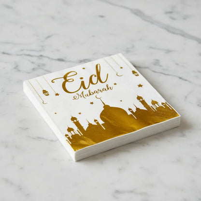 Stack of cards with 'Eid Mubarak' text on a marble surface