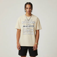 Person wearing a I'm Great at Multitasking beige t-shirt on a plain background