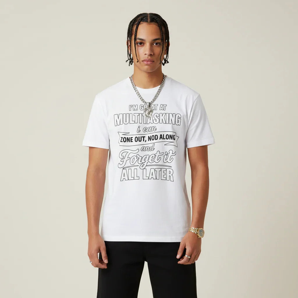 Person wearing a I'm Great at Multitasking white t-shirt on a plain background