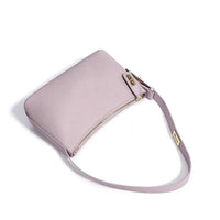 Light purple leather shoulder bag with gold zipper and hardware on white background
