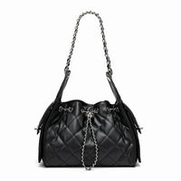Black quilted leather shoulder bag with chain strap and drawstring closure on white background.