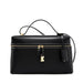 Black leather handbag with gold zipper, lock, and top handle.